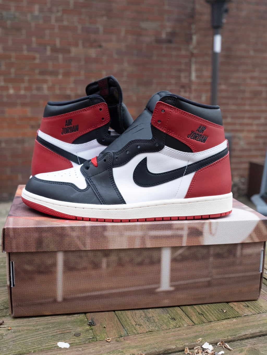 Air Jordan 1 Retro High OG (Black Toe Reimagined) Size 10